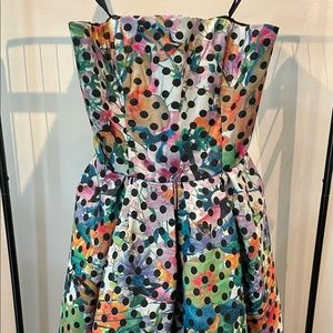 Cute patterned strapless peplum dress